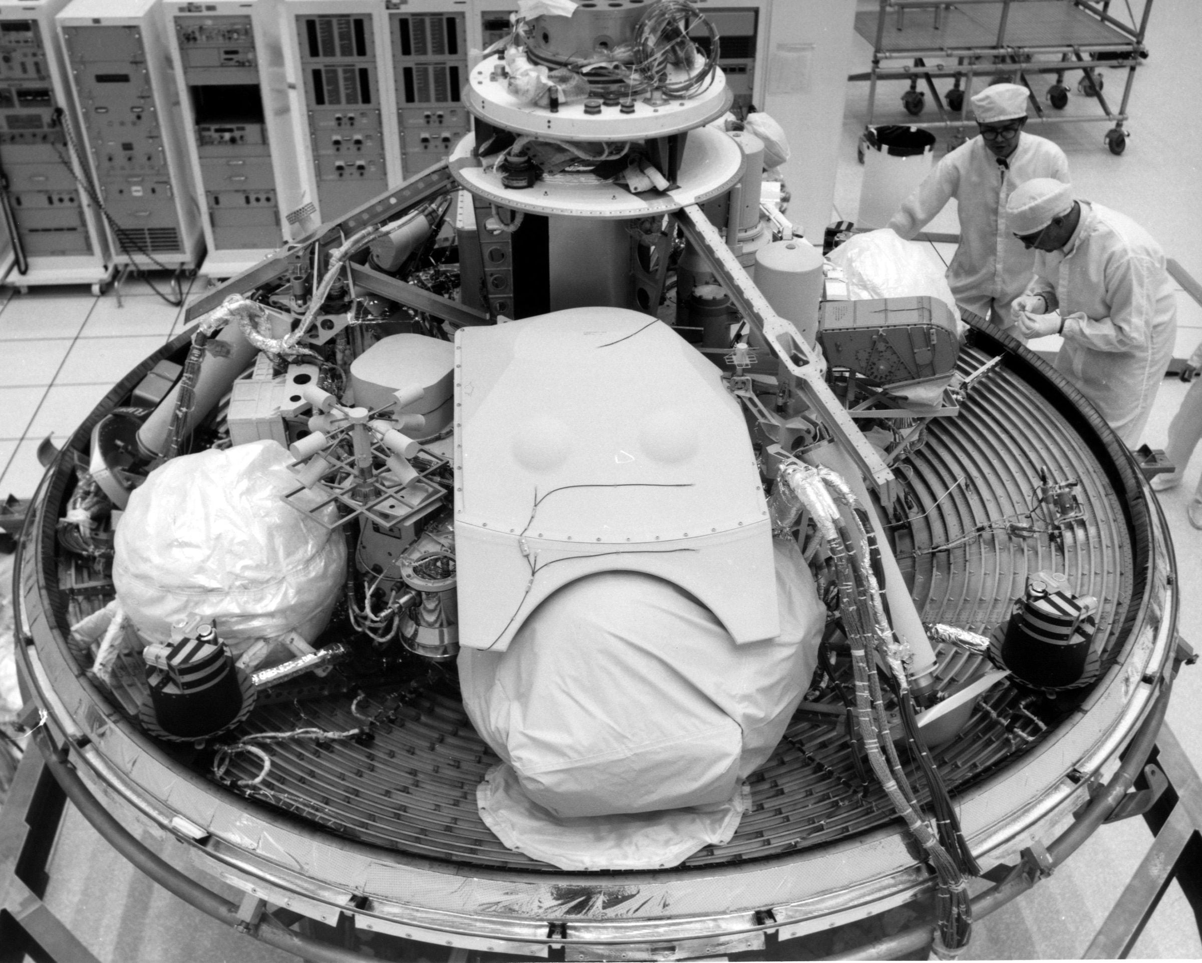 Technicians with the NASA Viking lander in a clean room